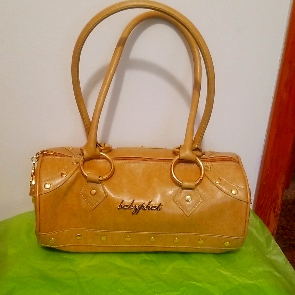 Baby Phat vintage leather purse.  Excellent condition.  Slight tarnish and fray